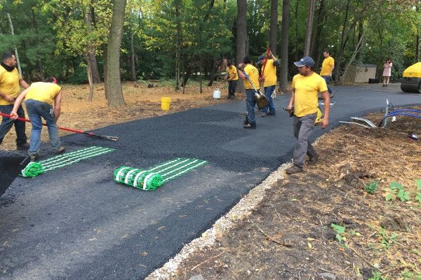 Installing snow melt mats on asphalt driveway