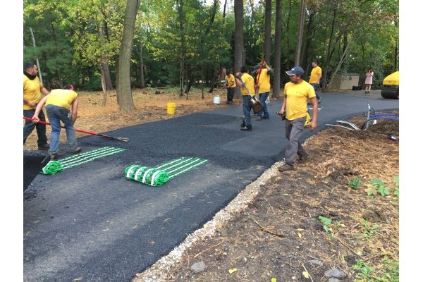 Installing snow melt mats on asphalt driveway