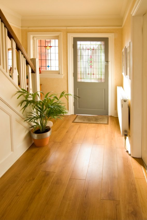 Lustrous hardwood floor in an entry makes any visitor welcome
