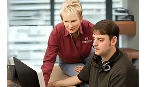 Julia Billen working with Customer Support