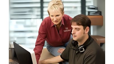 Julia Billen working with Customer Support