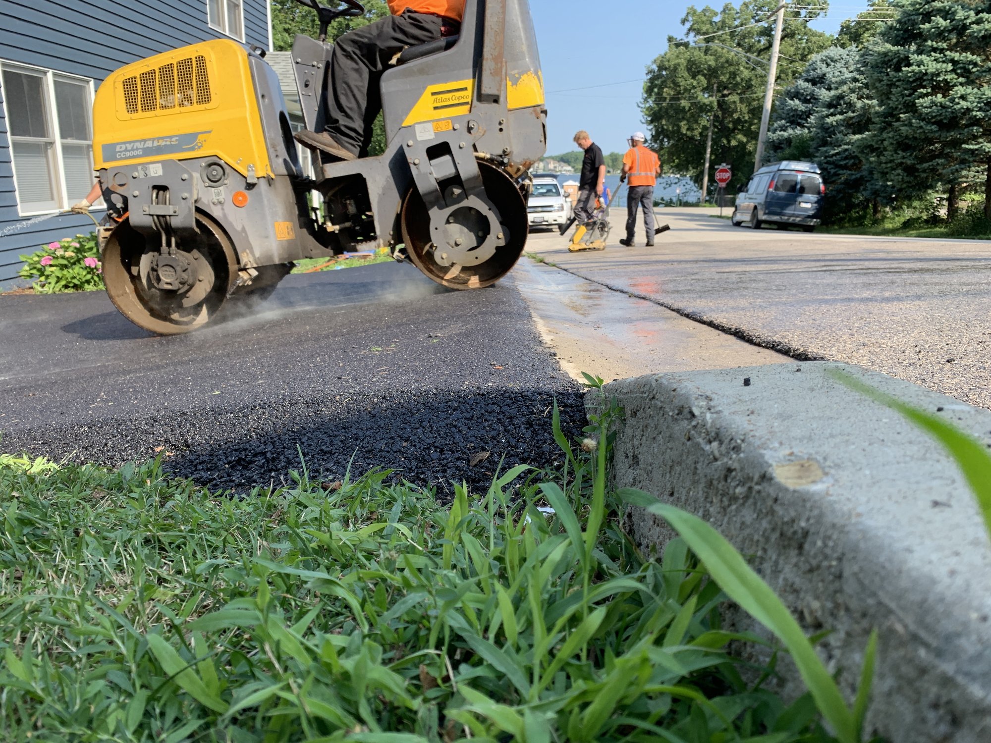 Kaplan Snow Melt for Driveway Installation compressing asphalt