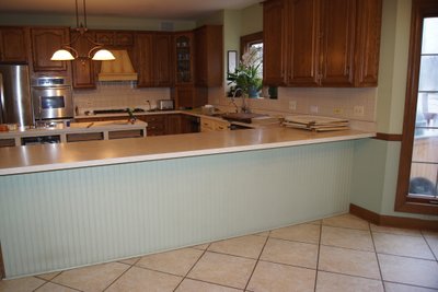 A Targeted Retro Fit Tile Project: Erasing the "Thermal Gap" in an Open-Concept Kitchen