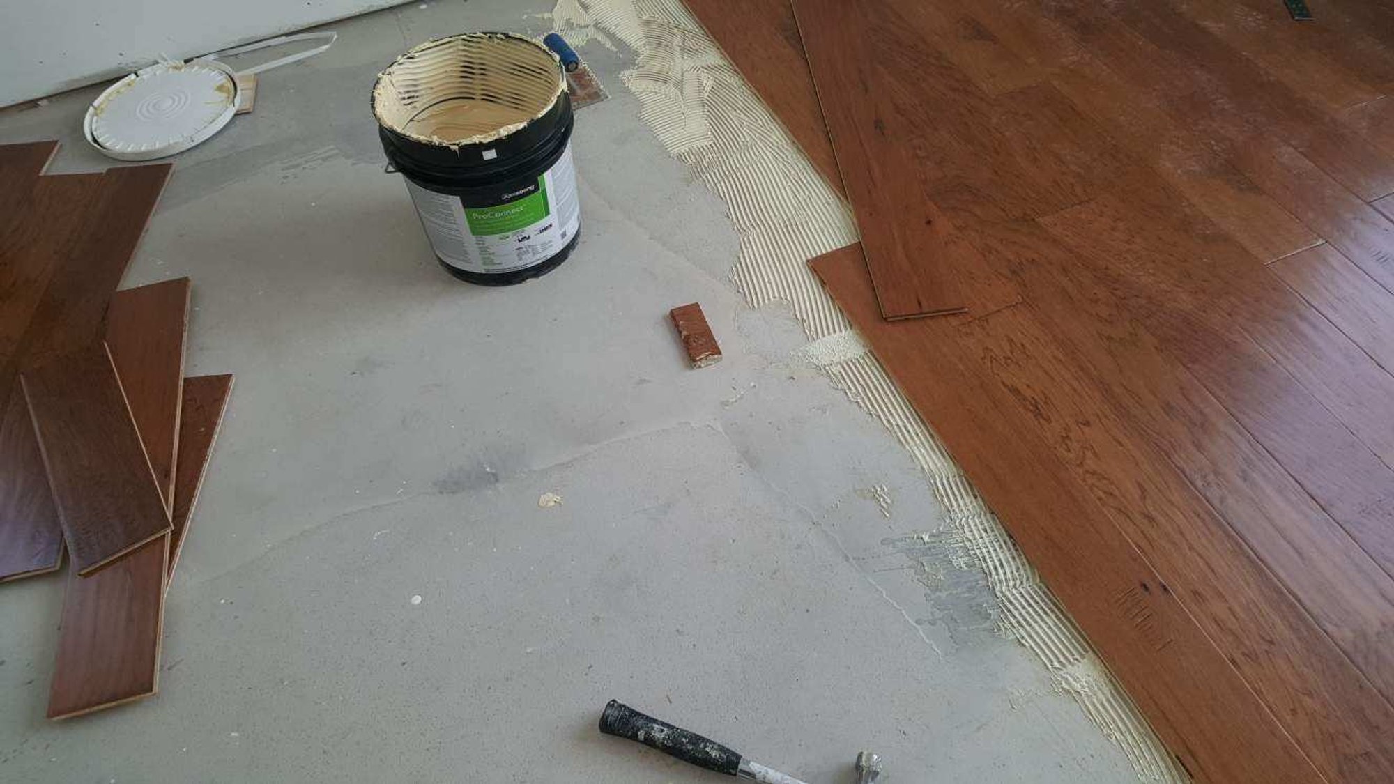 Kitchen Floor Install with Radiant Floor Heating wood over self leveling cement