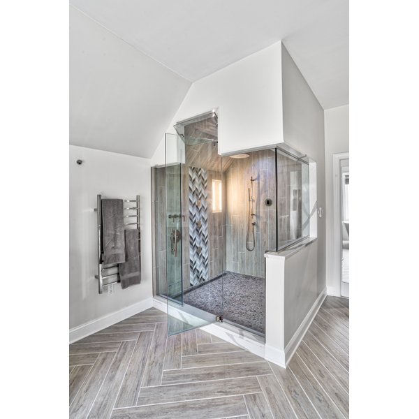 Large walk-in shower in a renovated bathroom