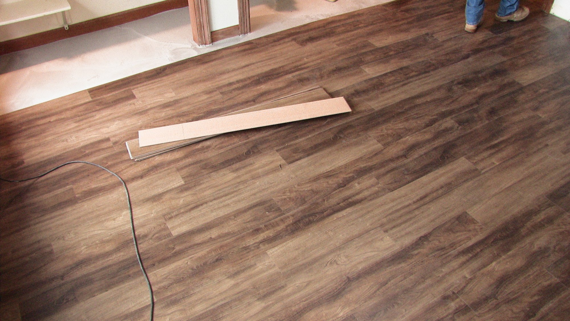 last few planks being installed with electric floor heating