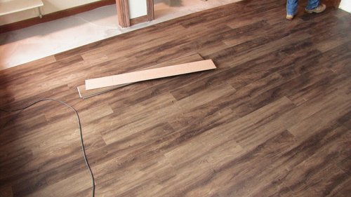 last few planks being installed with electric floor heating