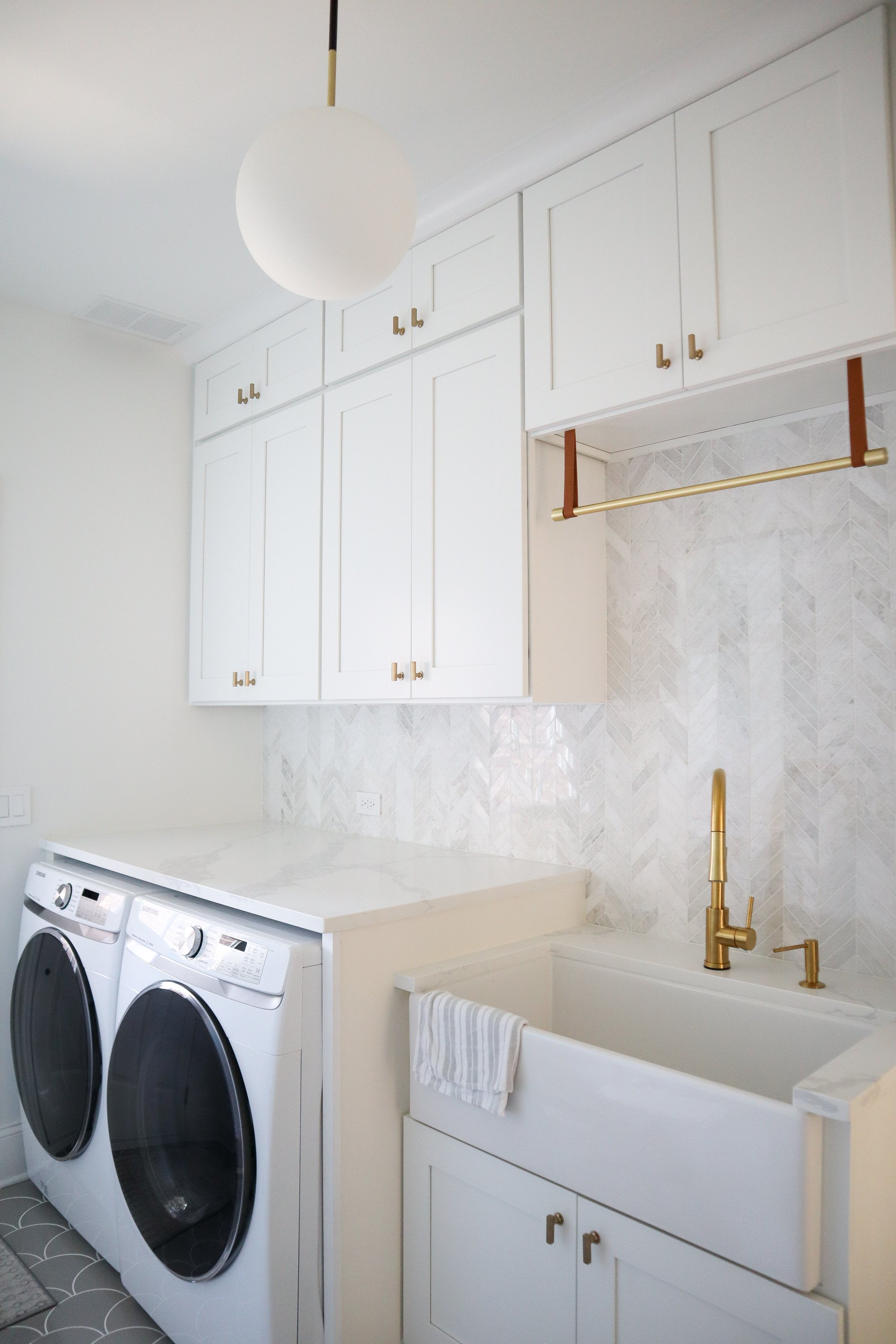 Laundry room with heated tile floor and brass fixtures OAK LAWN, IL