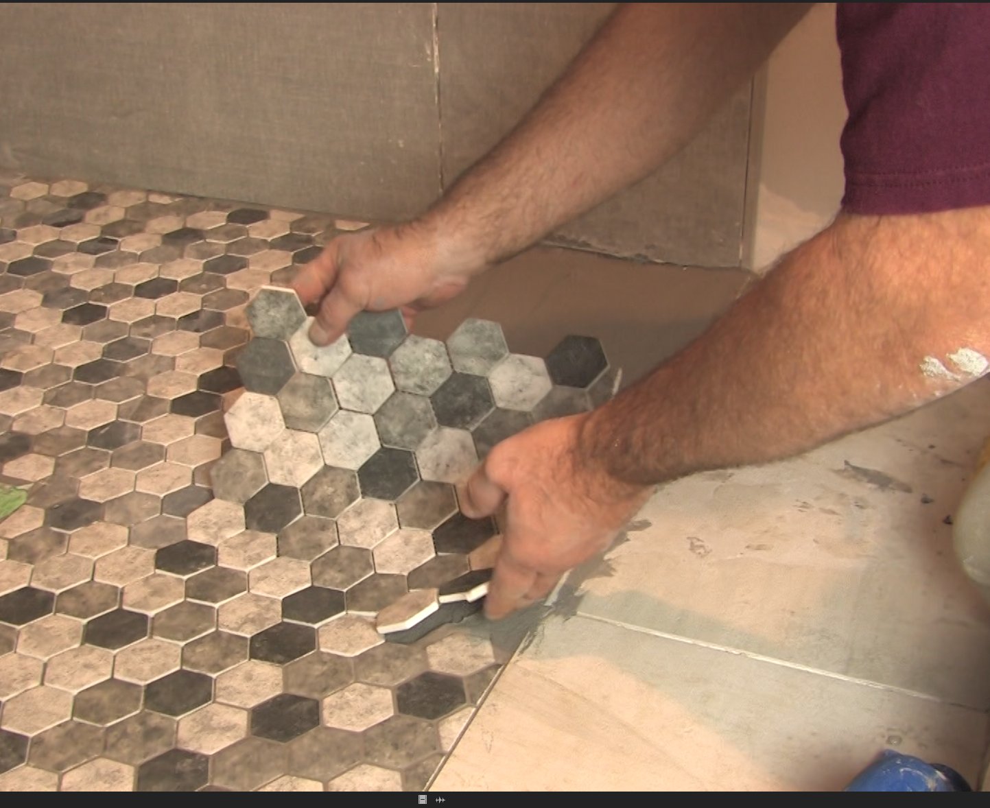 Laying tile over heated shower floor