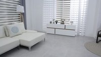 Living room with tile flooring