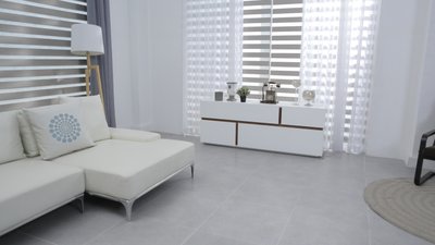Living room with tile flooring