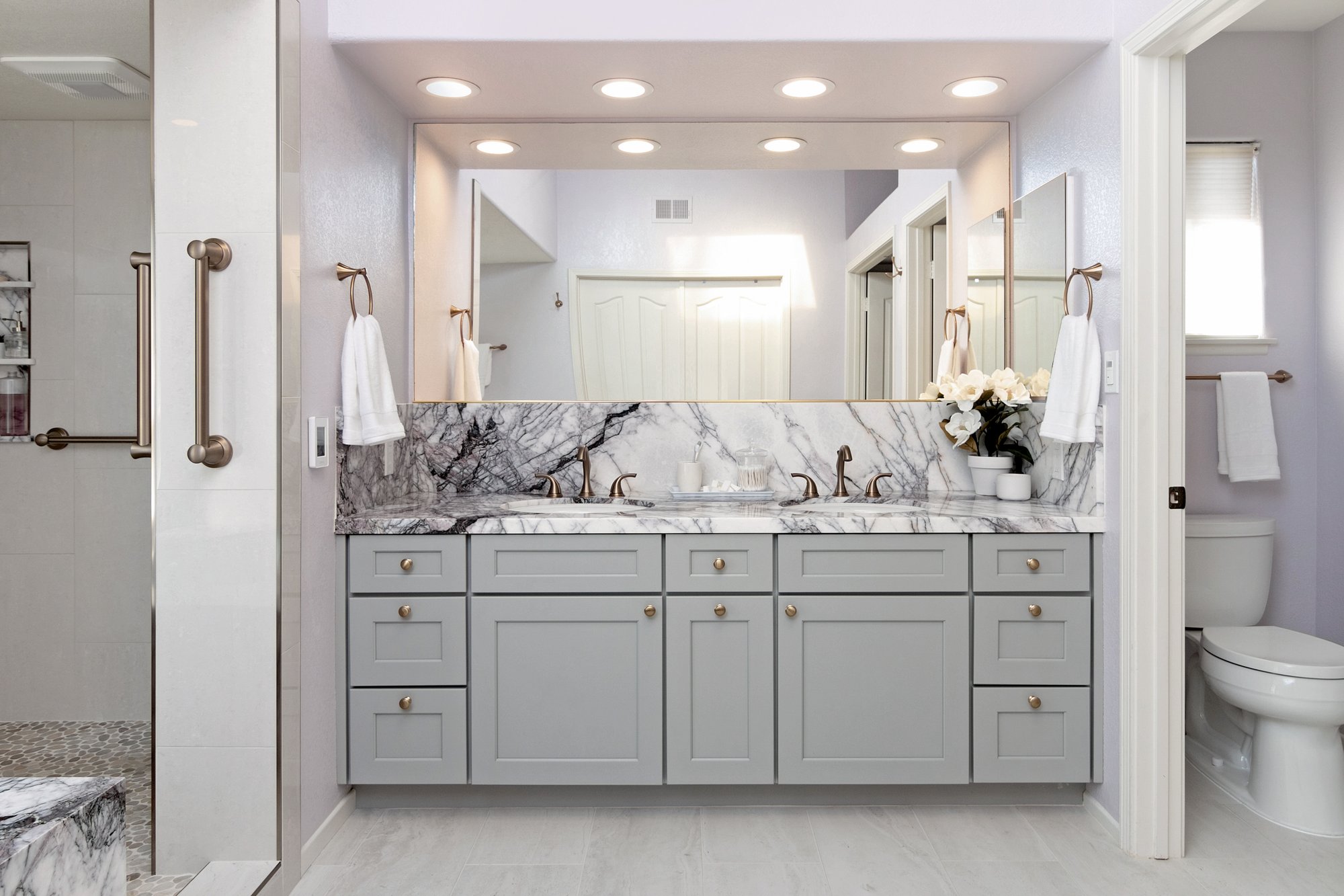 Marble master bath with electric floor heating vanity shot by kitchen places of ventura