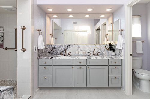 Marble master bath with electric floor heating vanity shot by kitchen places of ventura