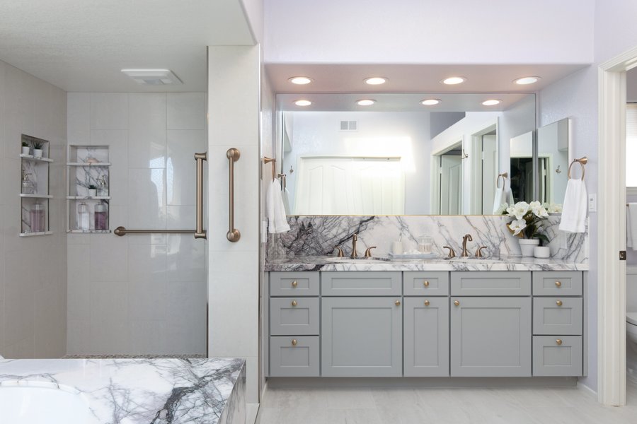 Marble master bath with electric floor heating vanity and shower shot by kitchen places of ventura