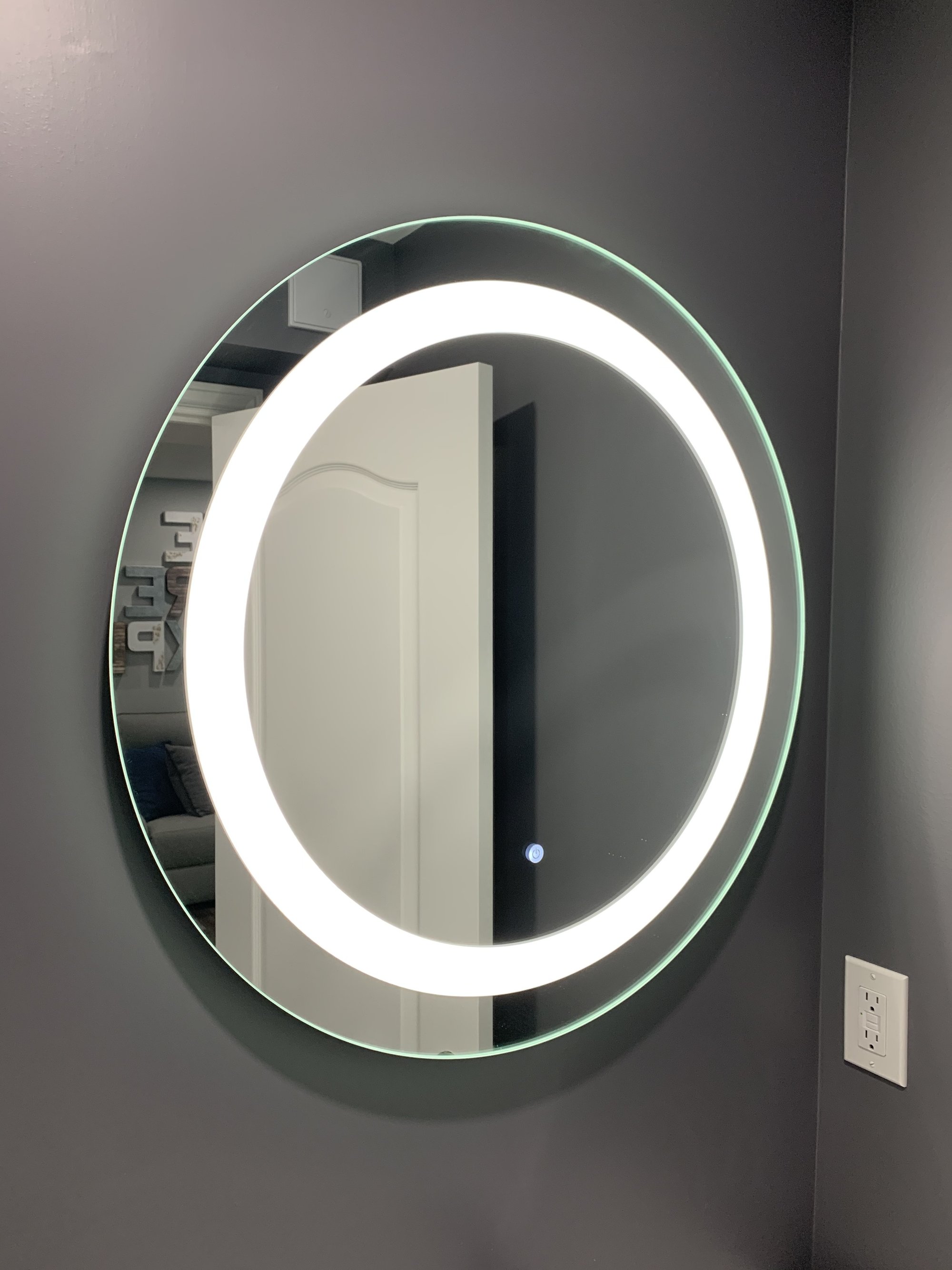 A Luxury Upgrade: Marilyn Backlit Mirror Enhances a Master Bath Design