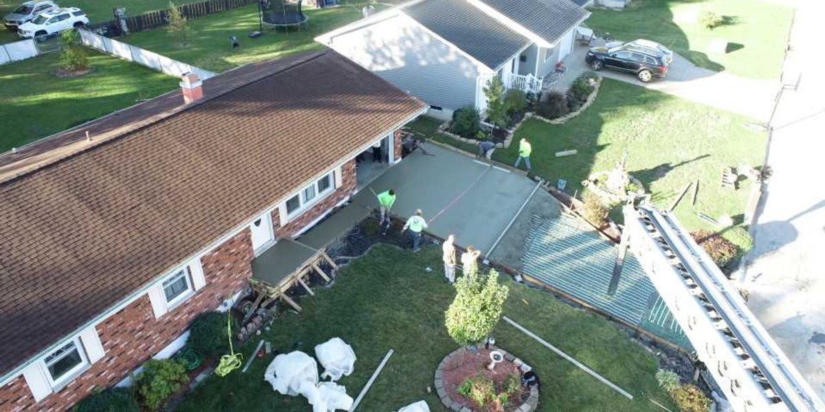 Mark Heston CN21984155 Share Your Story Heated Driveway Embedding Snow Melting Mats in Concrete