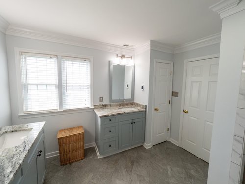 Master bath remodel with electric floor heating entryway and linen closet