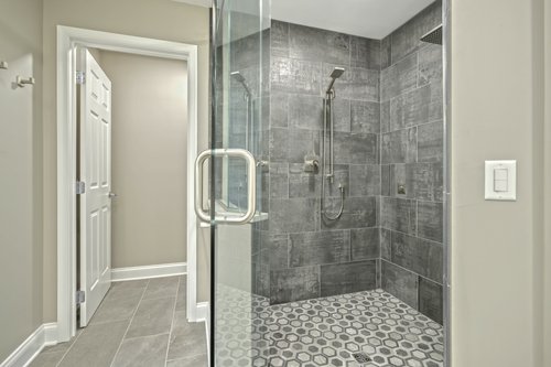 Master Bath remodel with tempzone flex roll floor heating shower enclosure within bathroom by red oak remodeling