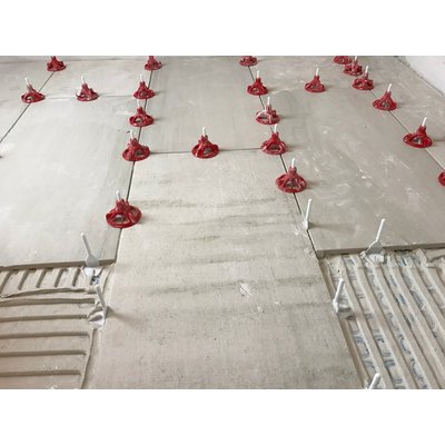 Mechanical tile leveling system