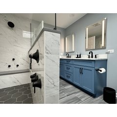 Modern bathroom with Flex Roll electric radiant floor heating installed beneath grey wood-look rectangular floor tiles.