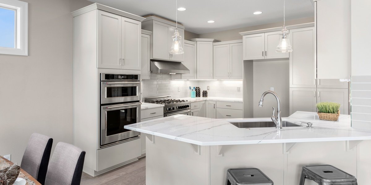 Modern Kitchen with Marble countertops and wood floor