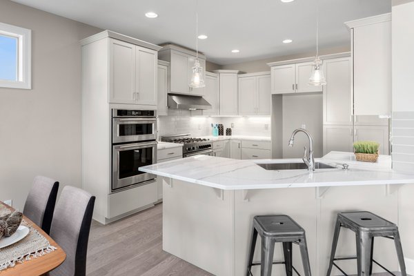 Modern Kitchen with Marble countertops and wood floor