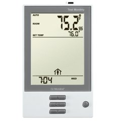White nHance UDG-4999 digital floor heating thermostat with an LCD screen displaying temperature and time settings.