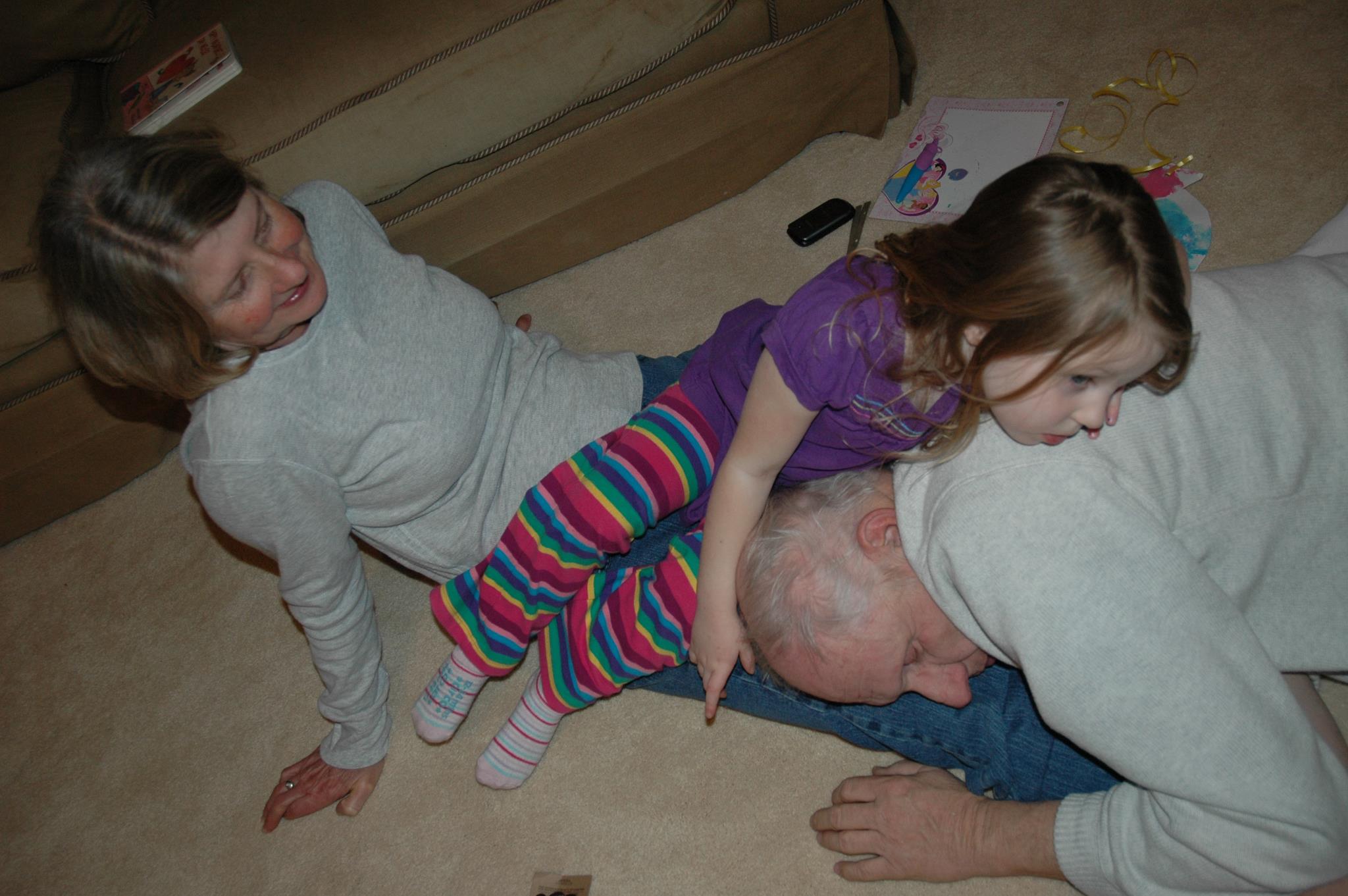Family playing on a heated floor