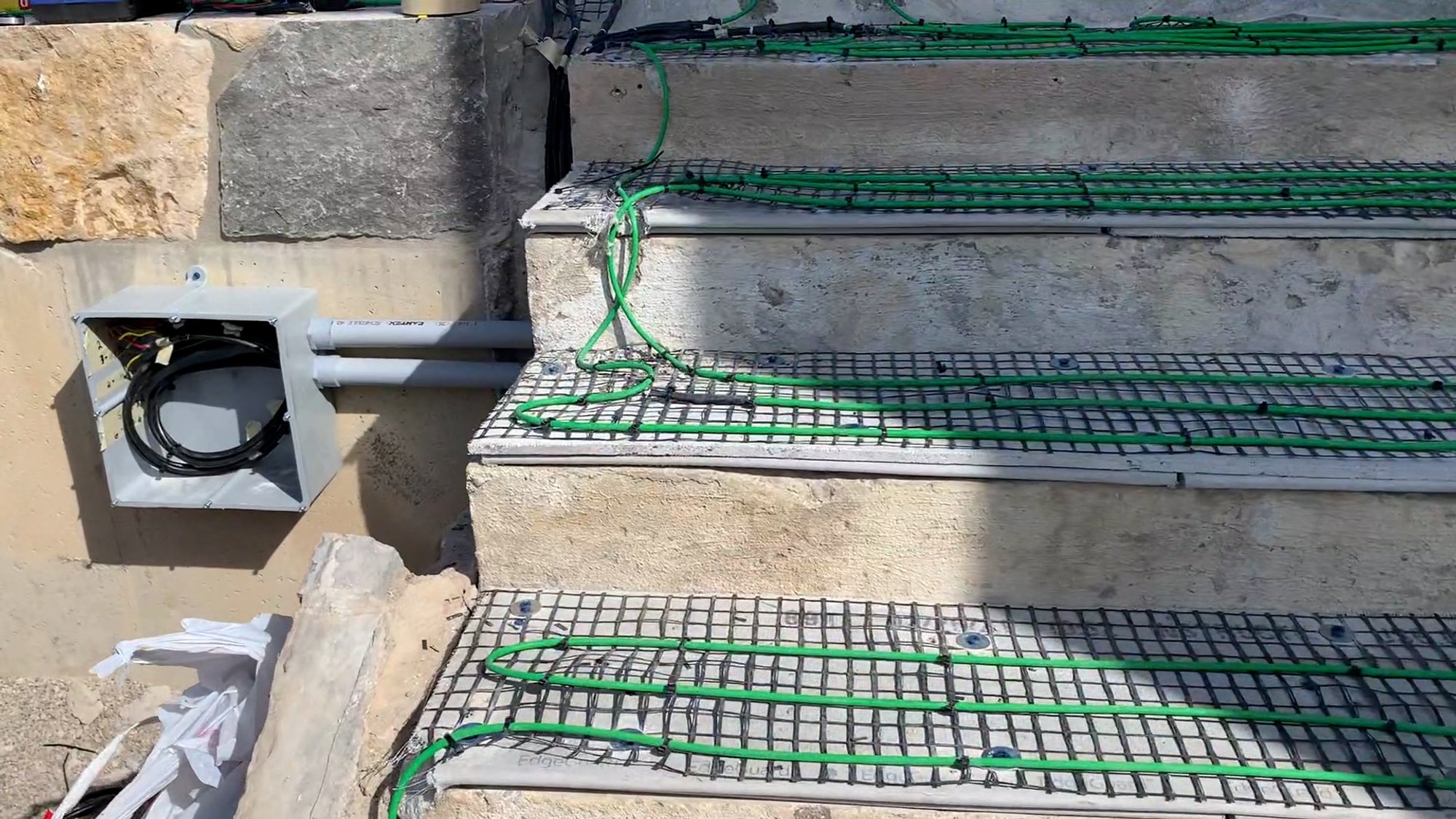Paver snow melt installation for heated stairs and terrace SmartInstall junction box