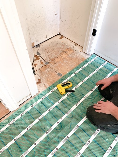 Placing floor sensor for floor heating installation OAK LAWN, IL