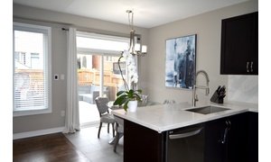 Post install shots from Laura's kitchen/dining nook with floor heating