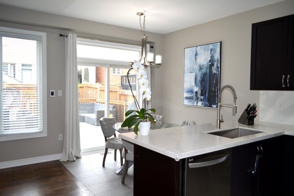 Post install shots from Laura's kitchen/dining nook with floor heating
