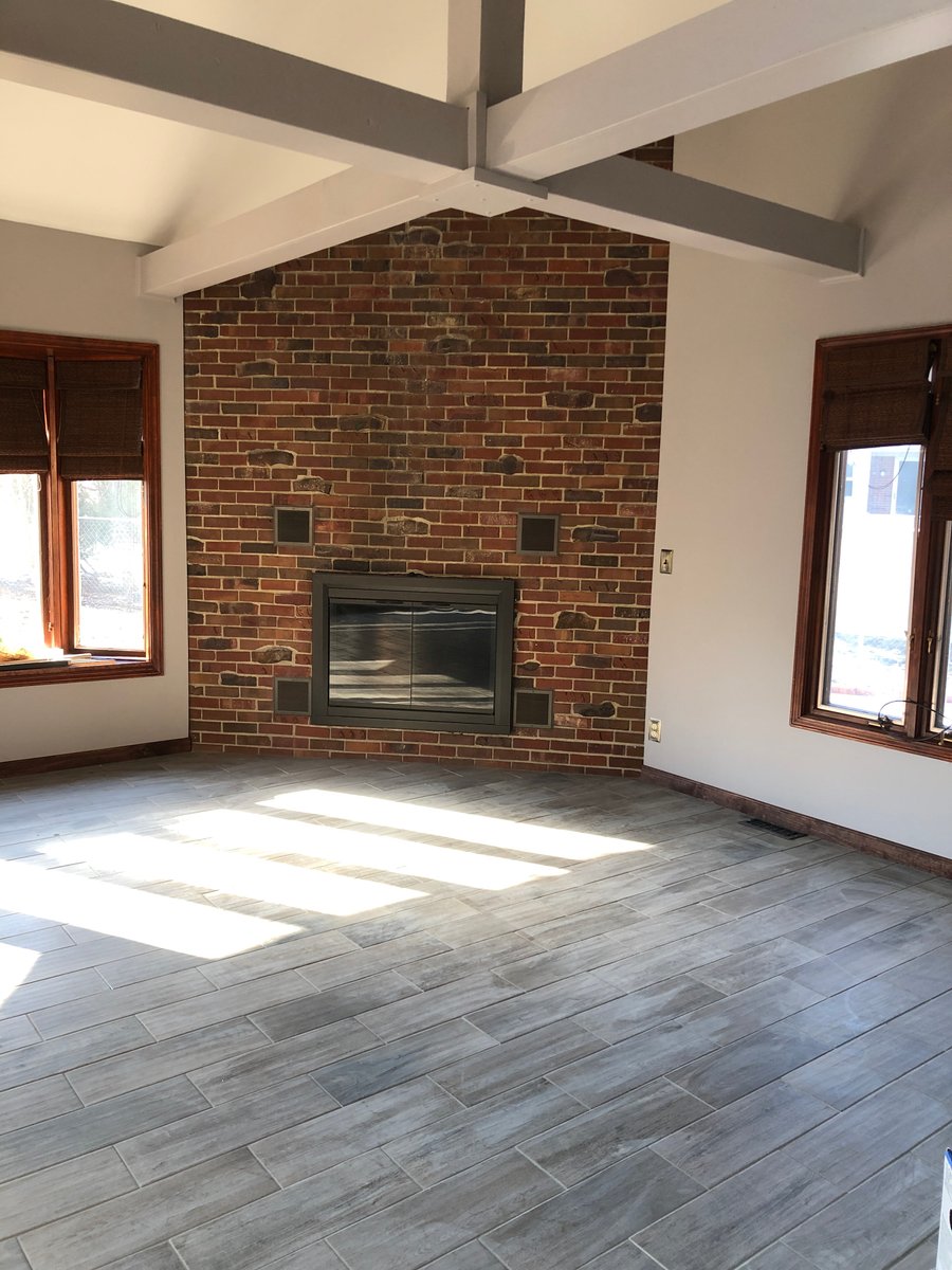 Post-installation of living room with electric heated tile floors