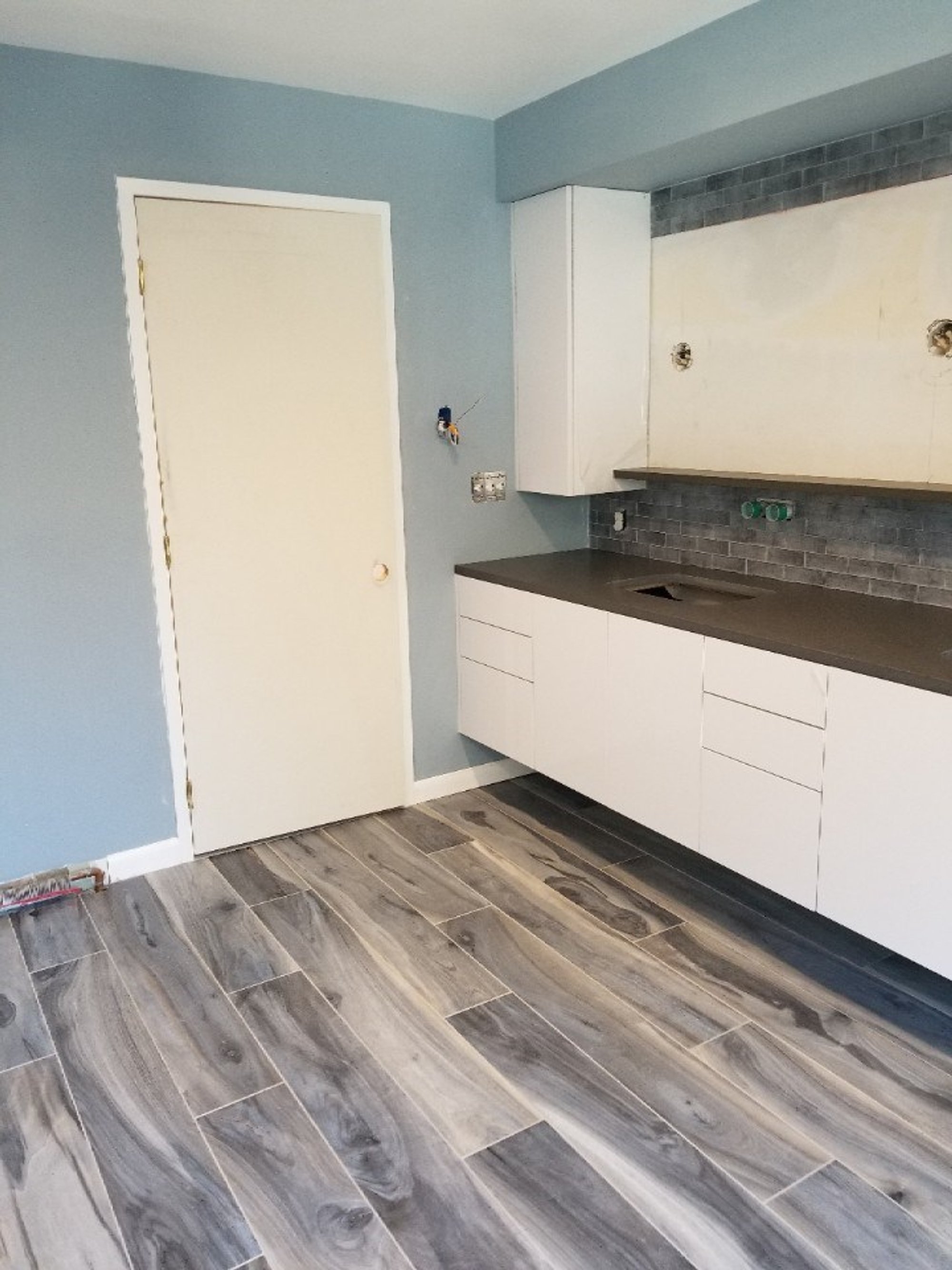 post-installation of luxury bathroom with heated tile floors PROVIDENCE, RI