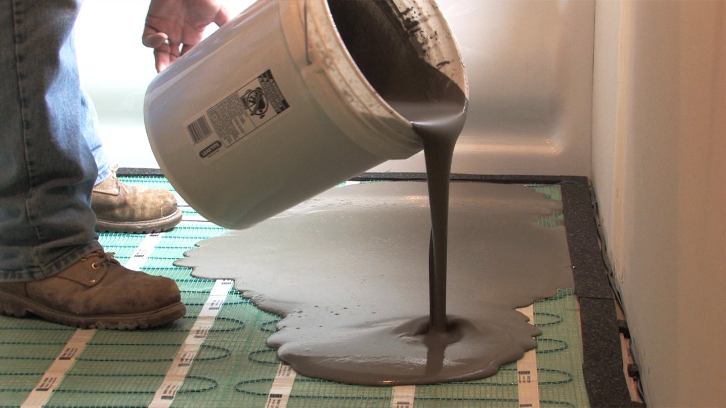Pouring self leveling cement over Floor Heating Mat Installation
