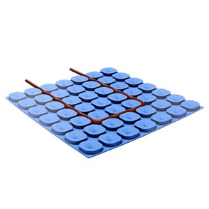 A dark red electric radiant heating cable installed in a U-shaped loop within the channels of a blue Prodeso uncoupling membrane.