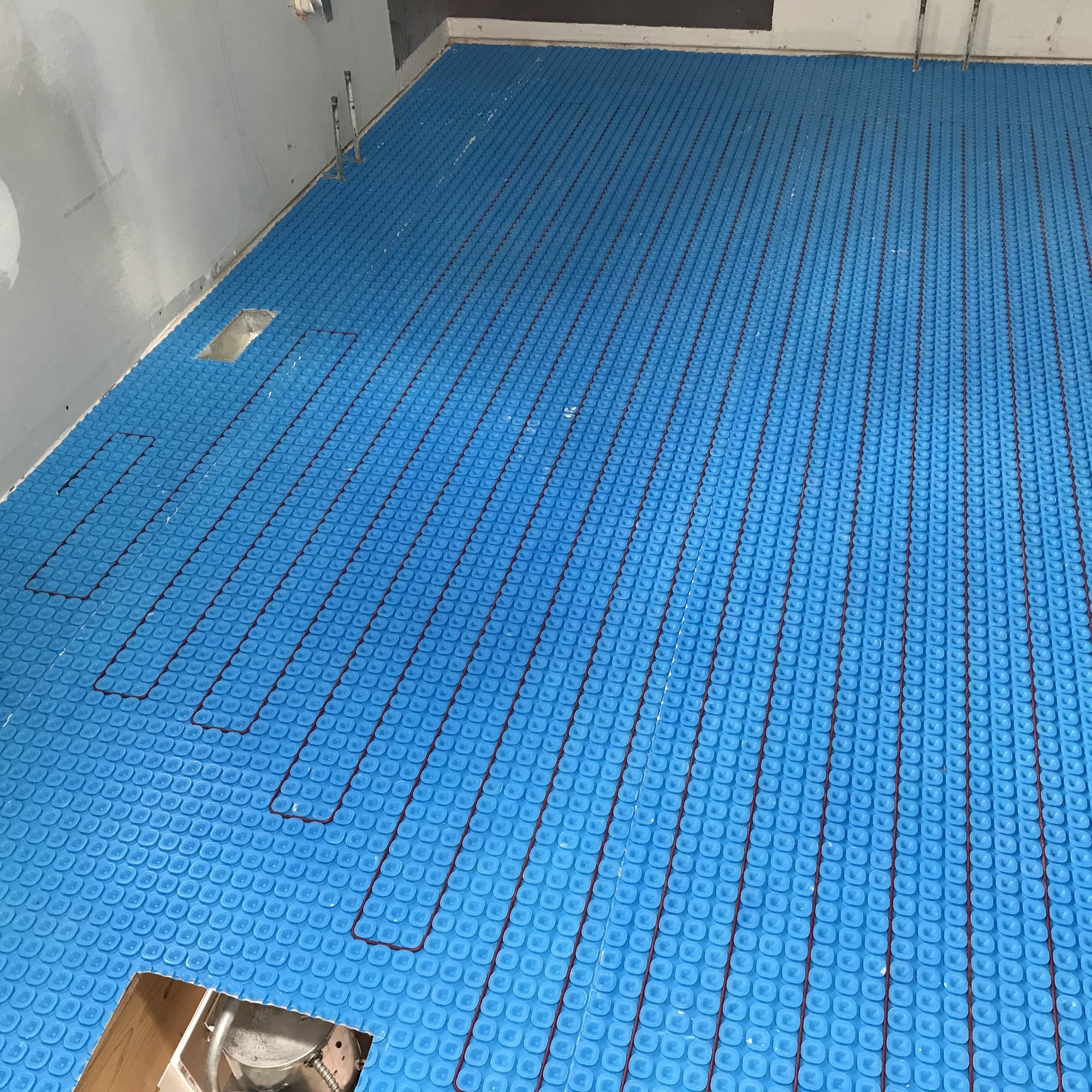 Prodeso Uncoupling Membrane Installation for Heated Tile Floors in Bathroom full room