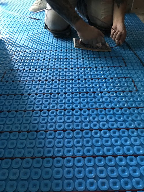 Prodeso Uncoupling Membrane Installation with tempzone cable for Heated Tile Floors in Bathroom