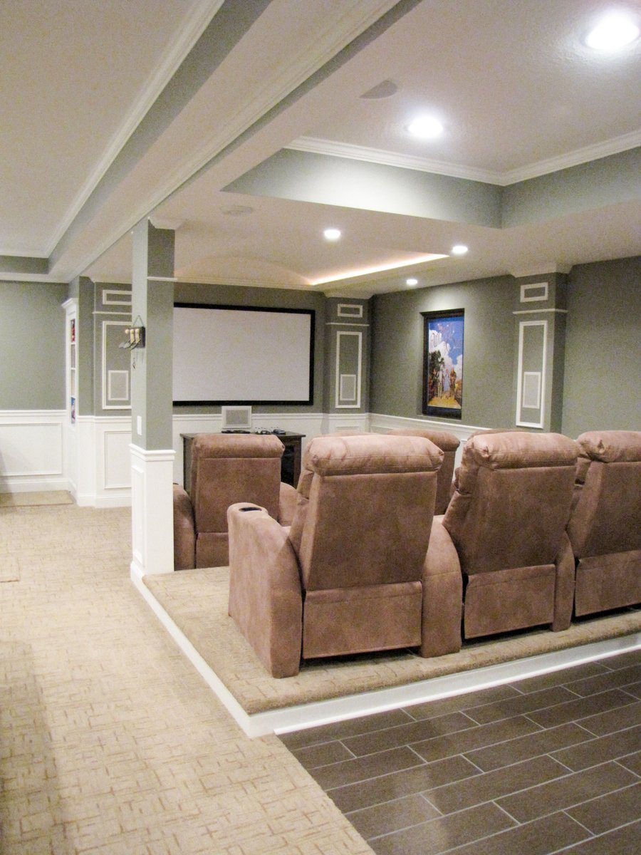 Floor heating on carpet in a recreation/media room.
