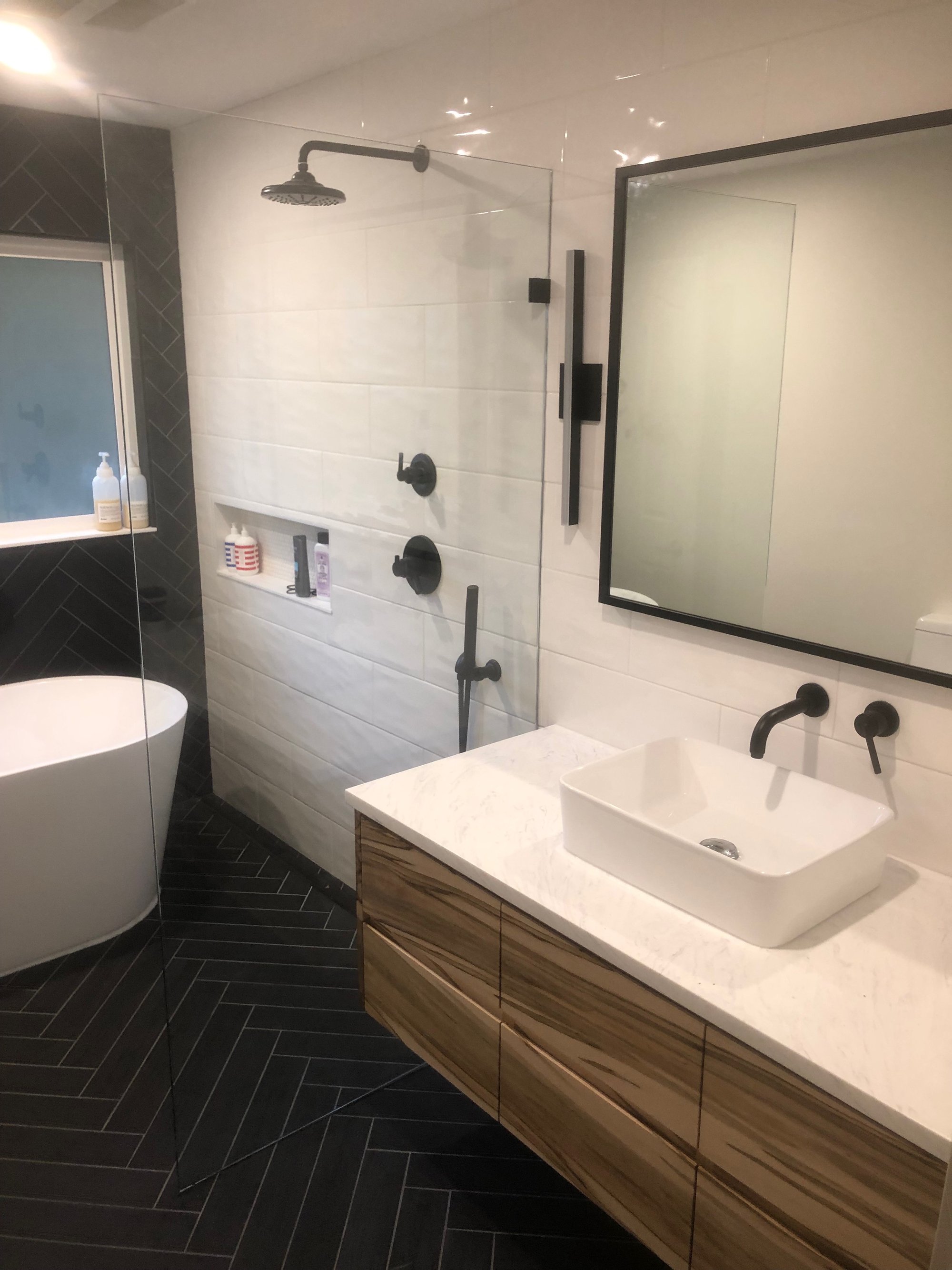 Remodeled bathroom with electric floor heating