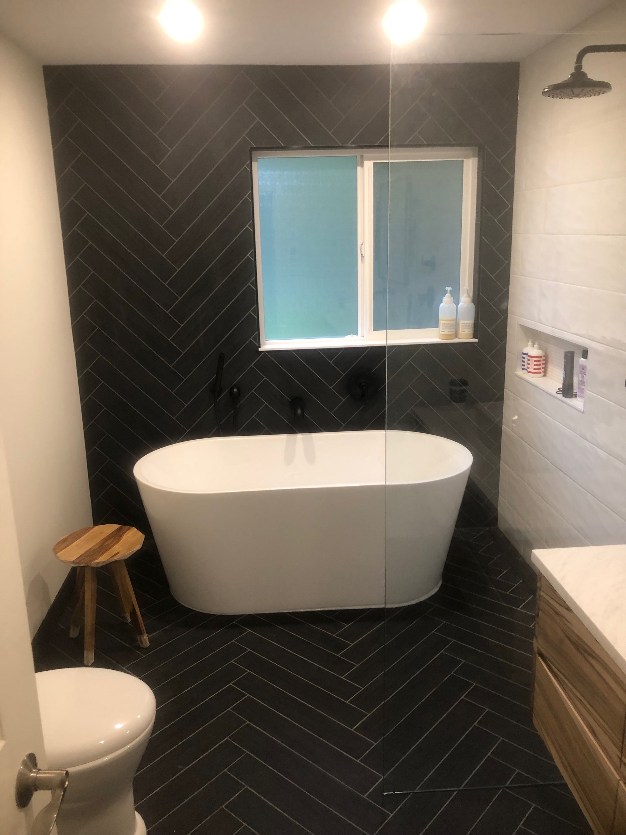 Remodeled luxury bathroom with walk in shower and tub with heated tile floors