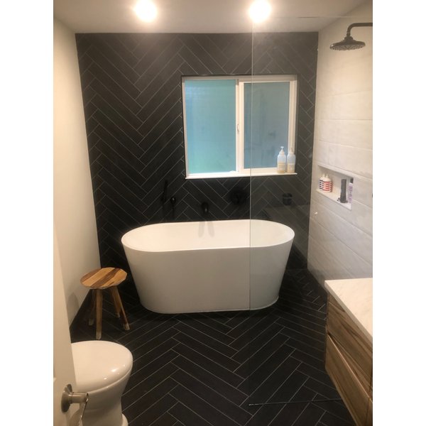 Remodeled luxury bathroom with walk in shower and tub with heated tile floors