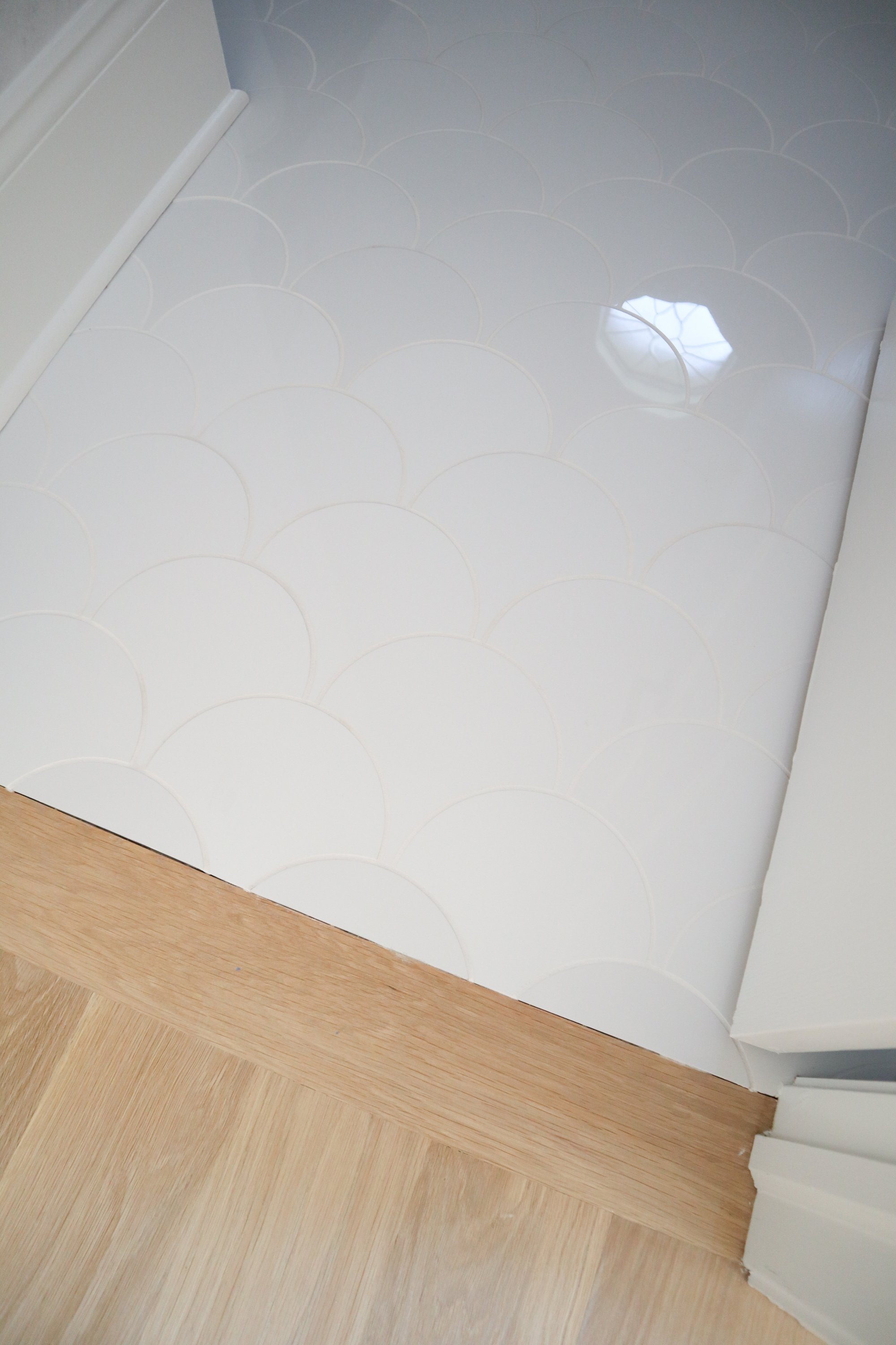 Remodeled Powder Room with electric floor heating under white mermaid scale tile OAK LAWN, IL