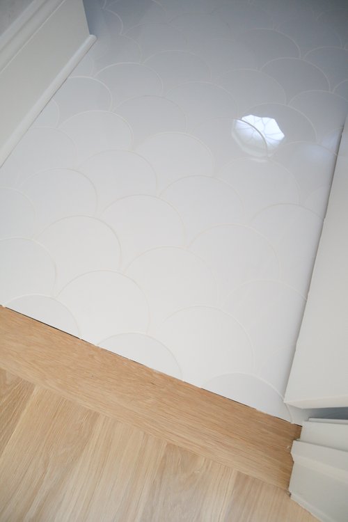 Remodeled Powder Room with electric floor heating under white mermaid scale tile OAK LAWN, IL