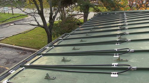 Roof and Gutter deicing installation for WarmlyYours Office