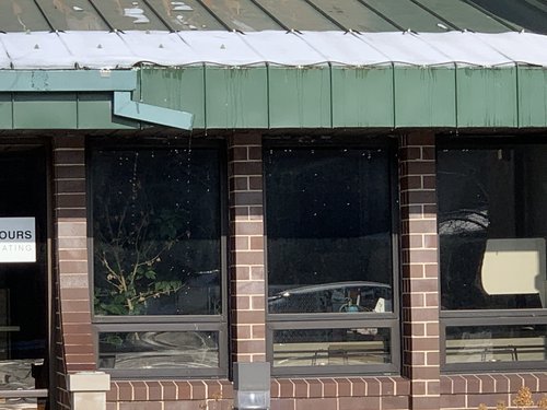 Roof and gutter installation with constant wattage front windows at warmlyyours office