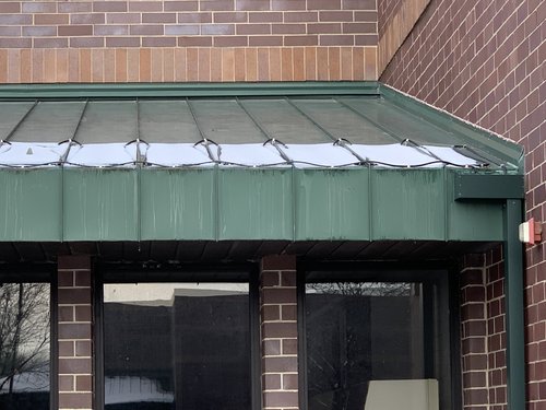 Roof and gutter installation with constant wattage warmlyyours office