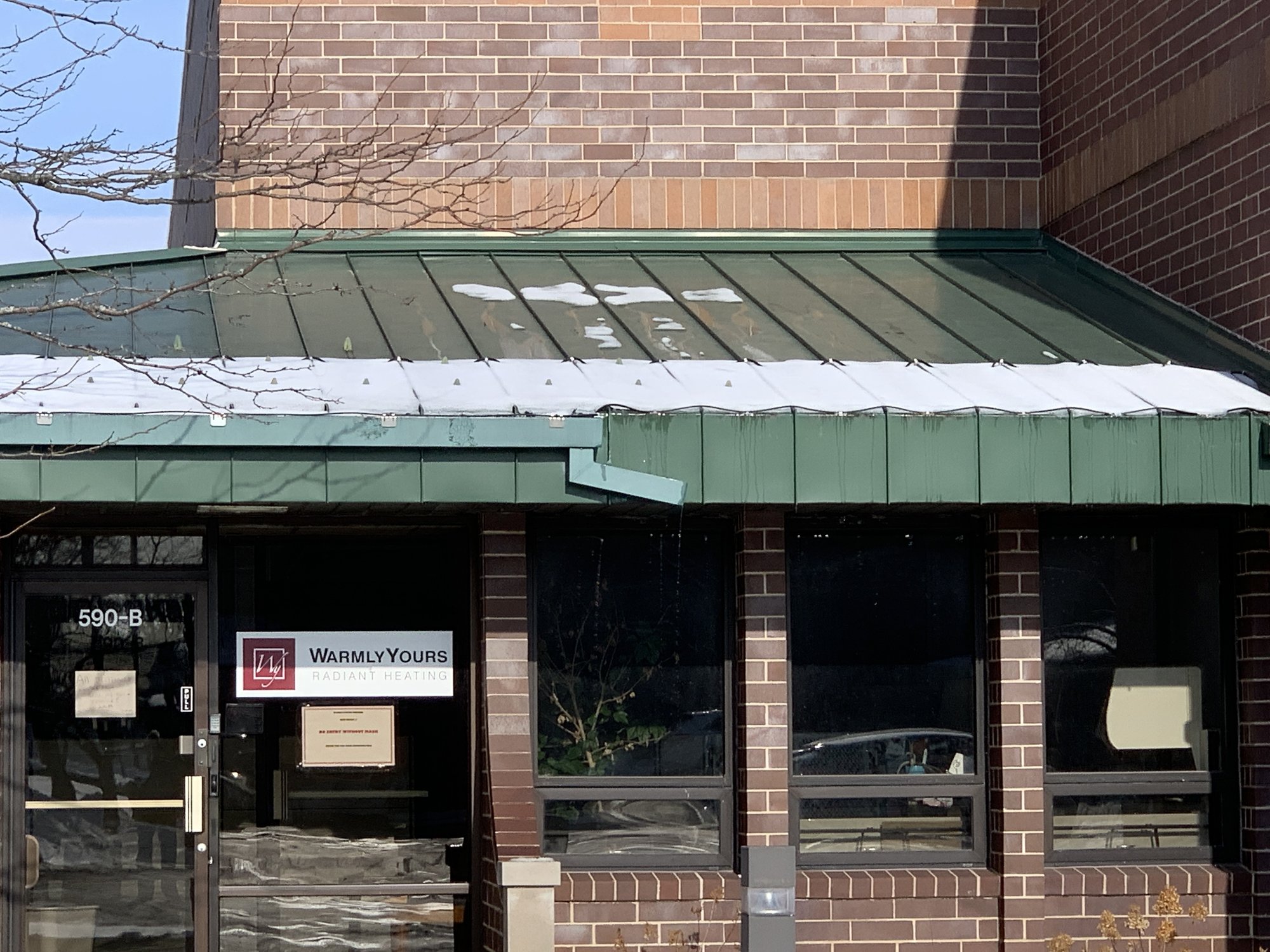 Roof and gutter installation with constant wattage with snow at warmlyyours office