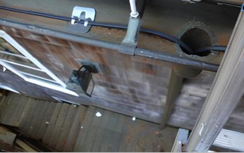 Roof & Gutter Deicing System installing in Gutter and Downspout