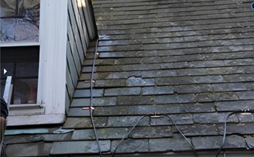 Roof & Gutter Deicing System installing on Slate shingle roof